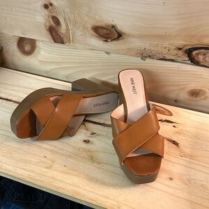 Brown heeled platform sandals